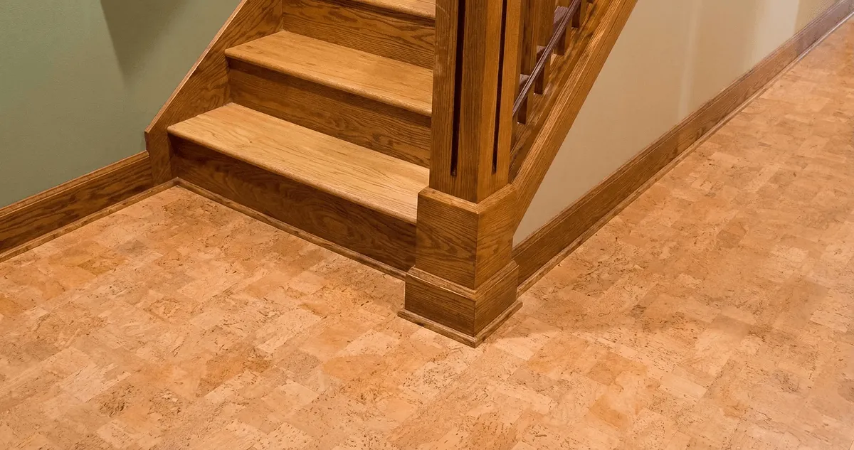 End of a staircase with cork flooring in Orange, CA